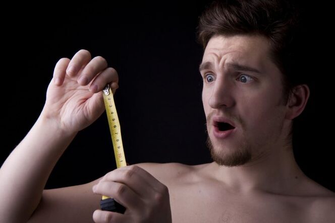 The man measured the member before his increase